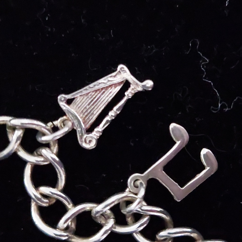 Sterling silver charm bracelet with music theme. - Picture 2 of 5